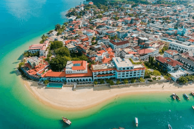 buy land in zanzibar as a foreigner